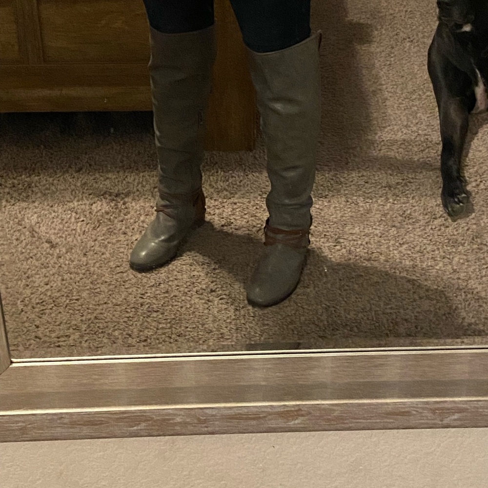 Brown and gray knee-high lace-up boots
